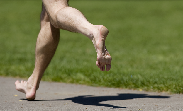 man running bare feet